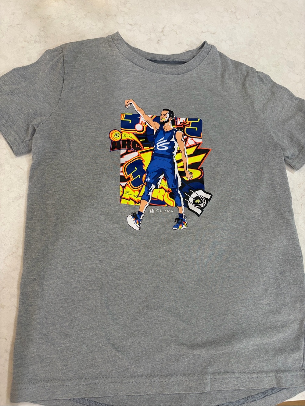 Under Armour Gray Kids Basketball Graphic Tee with Blue & Yellow Print